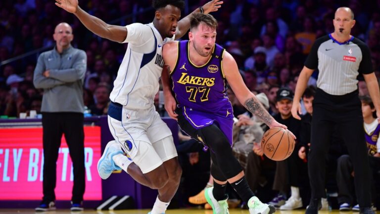 LOOK: Luka Doncic dribbles past former teammate and other pictures of the day in the NBA