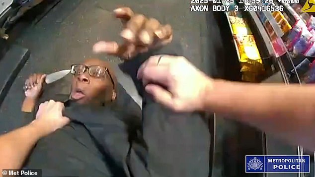 Moment hero police officer single-handedly restrains knife-wielding attacker during petrol station scuffle