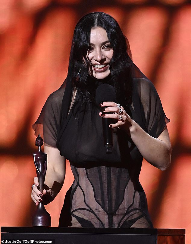 Charli XCX leads the BRIT Award winners after her BRAT album takes home FIVE trophies in epic sweep as the scantily clad singer admits ITV complained about her racy look