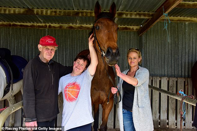 Sister of Melbourne-Cup winning jockey suddenly dies age 51 – as her heartbroken family break their silence
