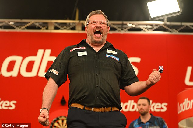 Darts star calls for investigation after Luke Littler’s opponent appeared to LICK rival in ‘disgusting’ pre-match moment