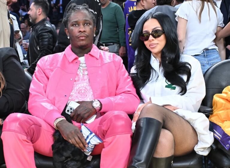 Mariah The Scientists Courtside Basketball with Young Thug Wearing a $740 Coperni Gathered Hem Shirt Dress and Amina Muaddi Boots