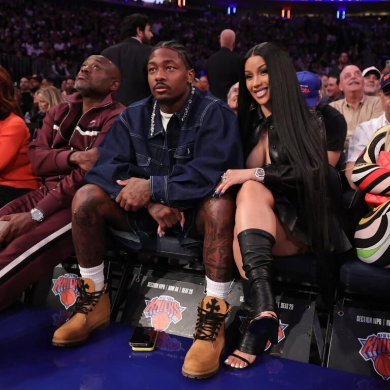 New Fashion Bomb Couple Cardi B and Stefon Diggs Sit Courtside with Cardi in a Leather Miu Miu Shirt and Skirt Set and Stefon in Simone Rocha Embellished Denim