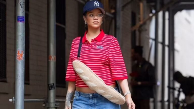 You Ask? We Answer! Rihanna Stepped Out in New York in a Red and White Martine Rose Polo, Blue Jeans, and a $1,350 Fendi Baguette-shaped Bag