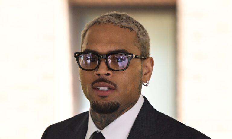 Chris Brown Seen W/ Jada Wallace, Fan Reacts To Photo Backlash