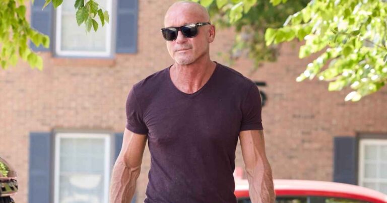 Tim McGraw Unveils Bald Head and Buff Muscles in Nashville