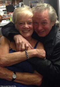 Drug dealers laugh and smile in the dock after they are cleared of murdering innocent elderly couple in arson attack