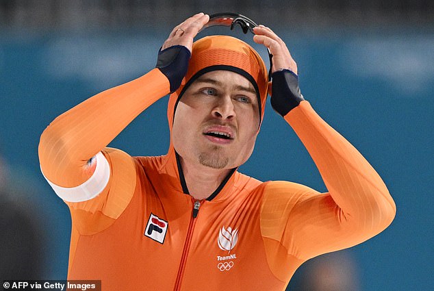 Furious world champion speed skater explodes with anger after colliding with Chinese rival at crucial moment of race… as he misses out on Winter Olympics gold