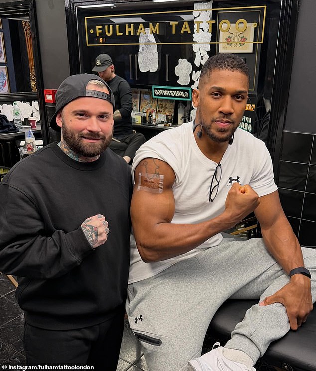 Anthony Joshua gets touching tattoo tribute to his two close friends killed in Nigeria car crash