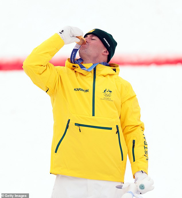 Australian Cooper Woods stuns the world to win gold in men’s moguls at Winter Olympics