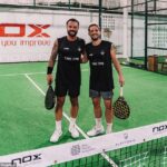 Terrifying moment an Aussie dad cheats death when a 3m-wall of glass explodes on top of him as plays game of padel ball in Bali