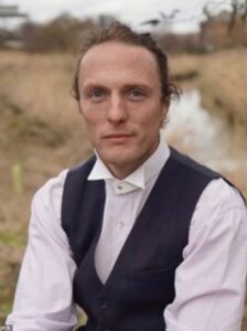 Cyclist who was fined in London for riding ‘no handed’ celebrates after CPS drop charges at the last minute