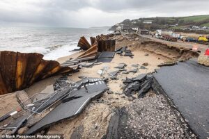 The villagers cut off from civilisation after storm destroyed coastal road that connects them to the outside world… and no one knows who’ll pay £18m bill to fix it