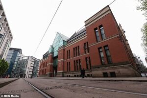 Husband appears in court charged with drugging and raping wife – and 12 other men accused of involvement