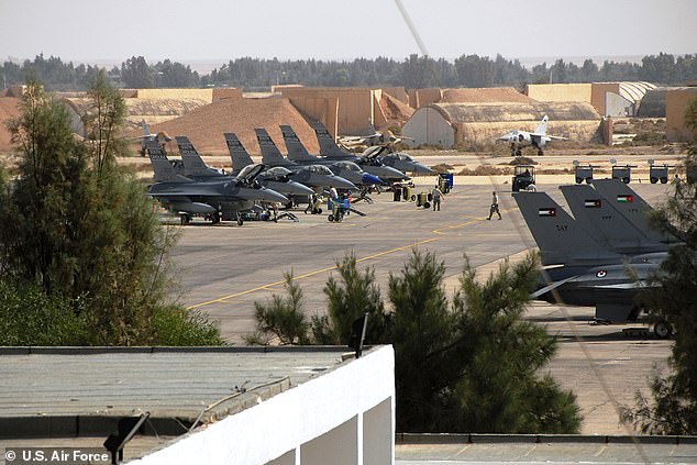 Chilling sign of Trump’s ‘imminent’ Iran attack as more than 60 US warplanes swarm key army base