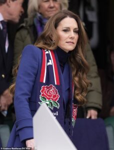 Kate keeps calm and carries on: Princess of Wales cheers on England in Six Nations rugby match as Royal Family reels from Andrew arrest