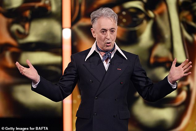 BAFTAs host Alan Cumming thanks audience for understanding as Tourette’s sufferer yells racial slurs during ceremony before leaving halfway through