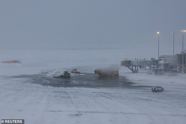 Almost every flight delayed or canceled at NYC and Boston Airports as blizzard brings 20 inches of snow to Empire State