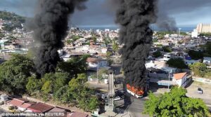 American couple trapped in Puerto Vallarta during first trip away from son, 4, tell family where to find their WILLS as cartel violence kills 14, resorts run out of food and Cancun vacationers ordered to shelter in place