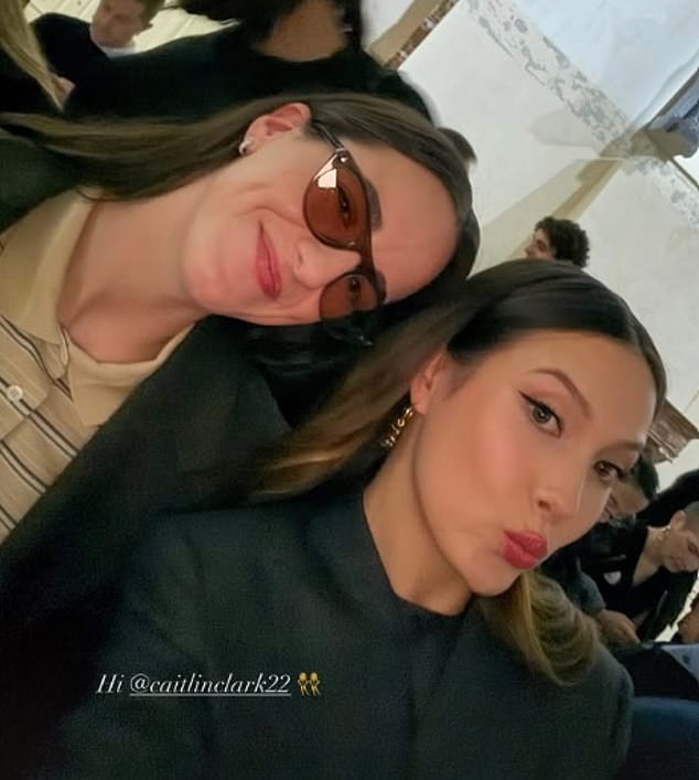 Caitlin Clark poses with Winter Olympics ‘traitor’ Eileen Gu as they sit together at Milan Fashion Week show