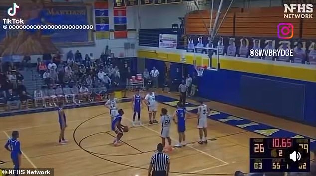Vile racial slur brings high school basketball game to abrupt halt as officials remove student spectators