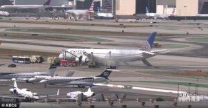 United Boeing 787 makes emergency landing at LAX after terrifying engine failure that saw passengers evacuate using slides