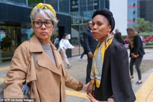 British woman sobs in court as she is convicted of blackmailing UK banker she falsely accused of raping her in Hong Kong