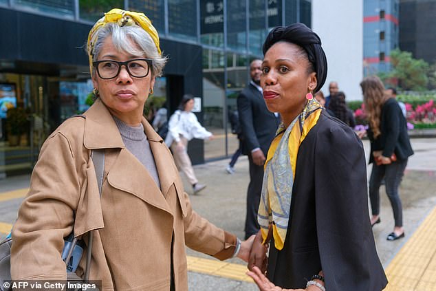 British woman sobs in court as she is convicted of blackmailing UK banker she falsely accused of raping her in Hong Kong