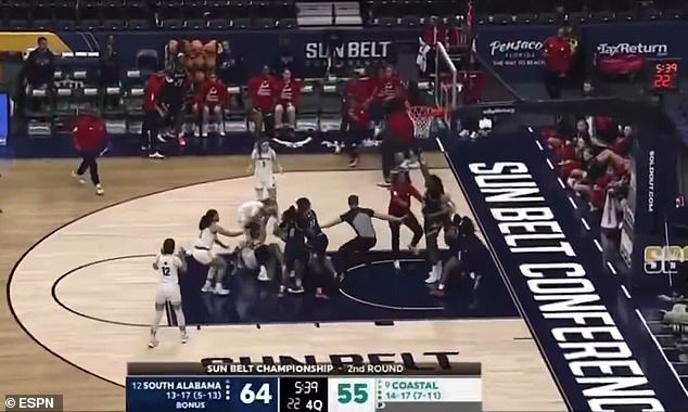 Wild women’s college basketball melee leaves ref injured as eight players are ejected from tournament game