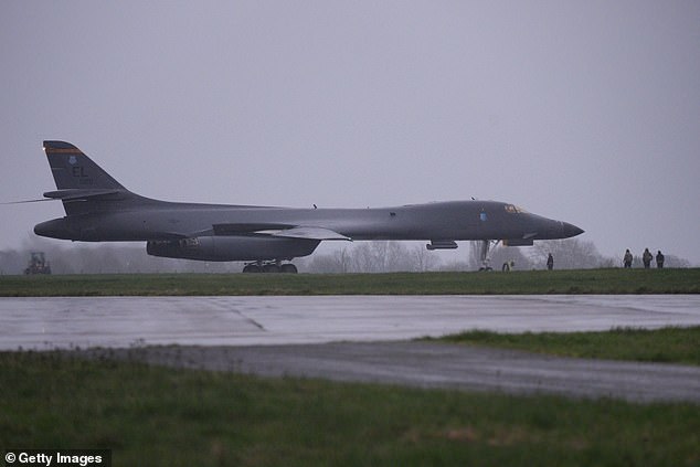 US bombers touch down in UK for ‘the big one’: B1s that can carry 34 tonnes of bombs land at RAF base as US promises ‘surge’ in attacks