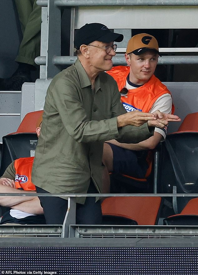 See the moment Tom Hanks becomes an honorary Aussie as he steals the limelight at AFL match