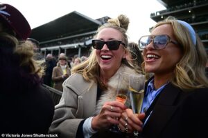 And they’re off (their heads!): Cheltenham punters enjoy boozy first day of races as pints flow in drunken start to the festival