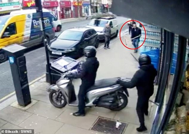 Moment heroes armed with just brooms tackle machete robbers during north London jewellery shop raid