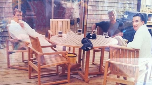 Never before seen picture of Andrew Mountbatten-Windsor and Peter Mandelson wearing bathrobes with Jeffrey Epstein uncovered in files