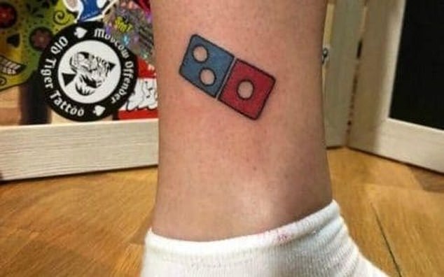 Pizza fan who had Domino’s logo tattooed to win free takeaways for life discovers the offer has been cancelled