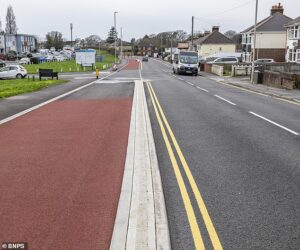 The £17million ‘white elephant’ cycle lane everyone loves to hate: Council builds 11ft-wide track with just three problems – it causes traffic jams, looks ugly and no one uses it
