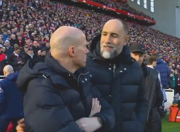 Fans claim Tottenham boss Igor Tudor ‘mistook bald staff member’ for Arne Slot as video clip goes viral before Liverpool clash – but mystery man’s TRUE identity is revealed