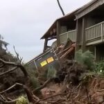 Oceanside condo building in paradise Hawaii resort suffers partial COLLAPSE as historic floods ravage island