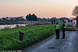 Body of girl found in hunt for two missing teenagers after car plunged into river