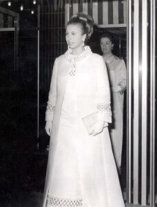 The Queen of Royal recycling! Princess Anne slips into floor-length coat for King’s state banquet… 57 YEARS after she first wore it