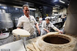 Life goes on as war rages around them: Iranians try to continue as normal as conflict spreads across region and sparks global economic chaos