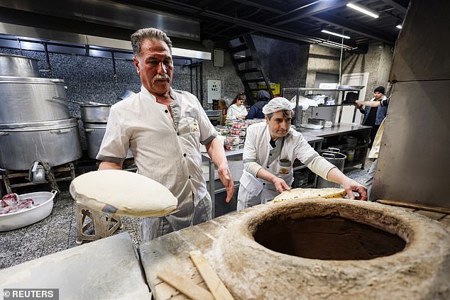 Life goes on as war rages around them: Iranians try to continue as normal as conflict spreads across region and sparks global economic chaos