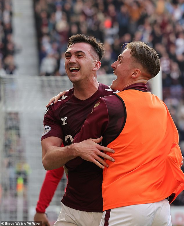 HEARTS 1 DUNDEE 0: McEntee heads winner which keeps hosts ticking towards title