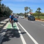 Raging BMW driver swerves into cycle lane and starts hurling objects at bikers in ritzy Newport Beach