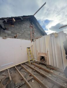 Young family is left homeless and couple using tarpaulin sheets for windows after cowboy builder ‘conned them out of £100,000’