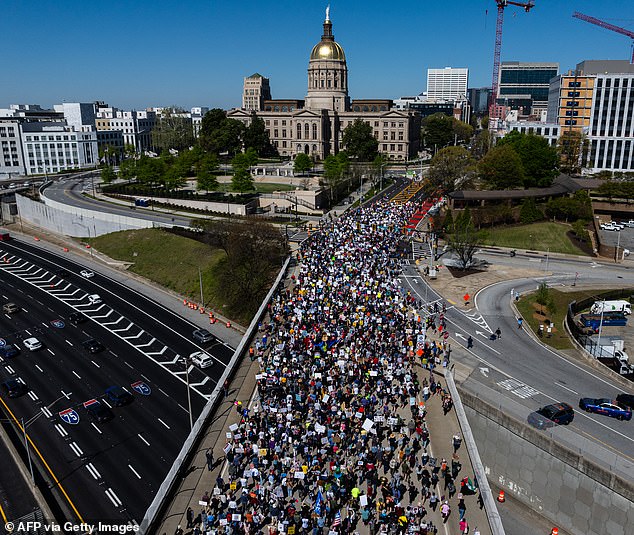 Mayhem erupts at No Kings protests across America as rioters pelt agents with rocks, tear gas is unleashed and rival mobs clash outside one of Trump’s prized properties