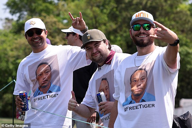 Golf fans wear Tiger Woods mugshot shirts at PGA Tour event days after his shocking DUI arrest