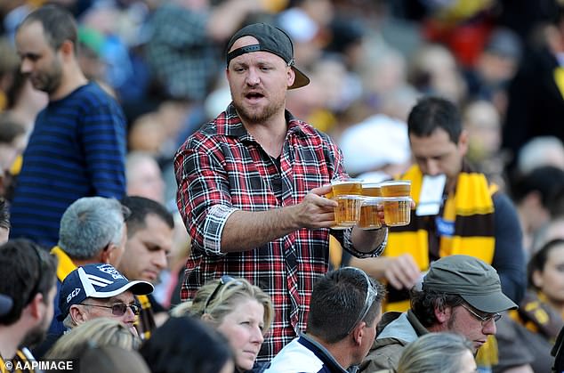 Fun police stop AFL fans from having a drink at matches because their drinks ‘had too much beer in them’