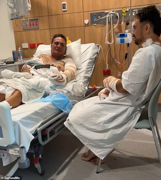 Father and son left fighting for life after allegedly being STABBED in their own backyard in a terrifying neighbourhood dispute