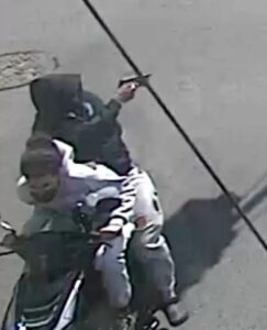 Moment NYC gunman shoots BABY dead on Brooklyn street in broad daylight before fleeing on back of scooter